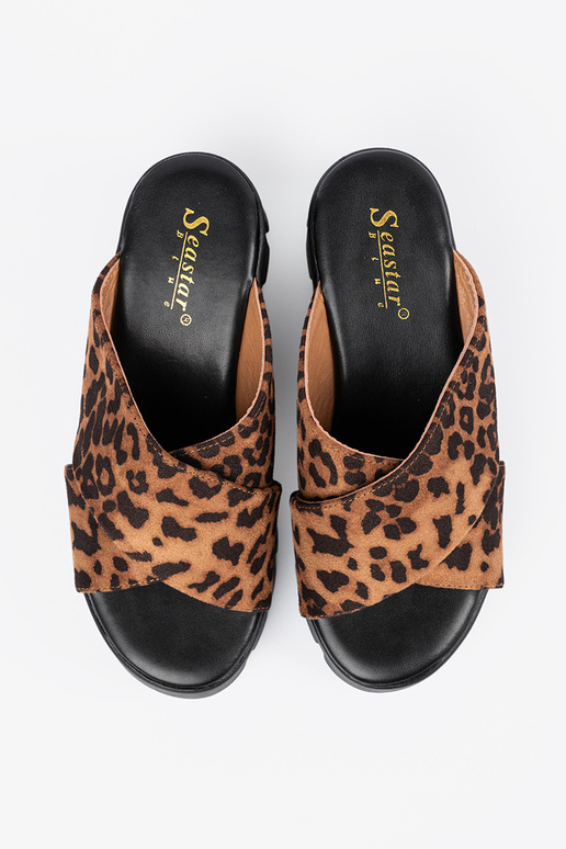 of suede slippers Inomens on a Inedge...