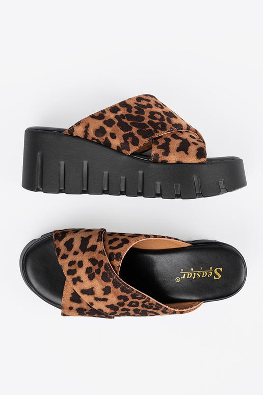 of suede slippers Inomens on a Inedge...