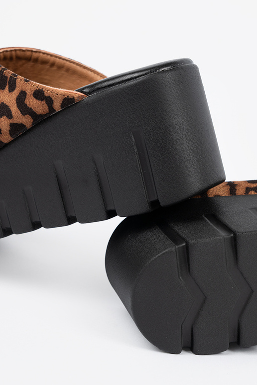 of suede slippers Inomens on a Inedge...