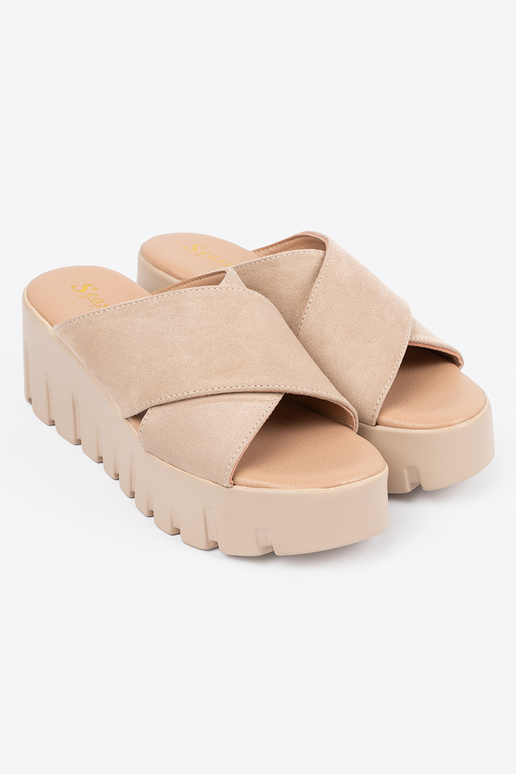 of suede slippers Inomens on a Inedge...