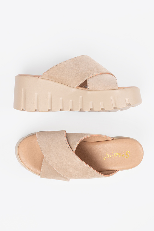 of suede slippers Inomens on a Inedge...