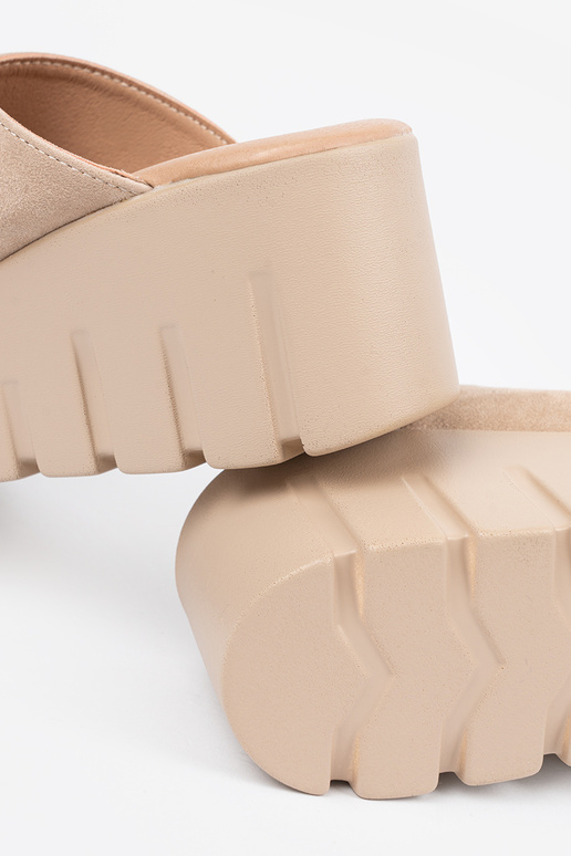 of suede slippers Inomens on a Inedge...