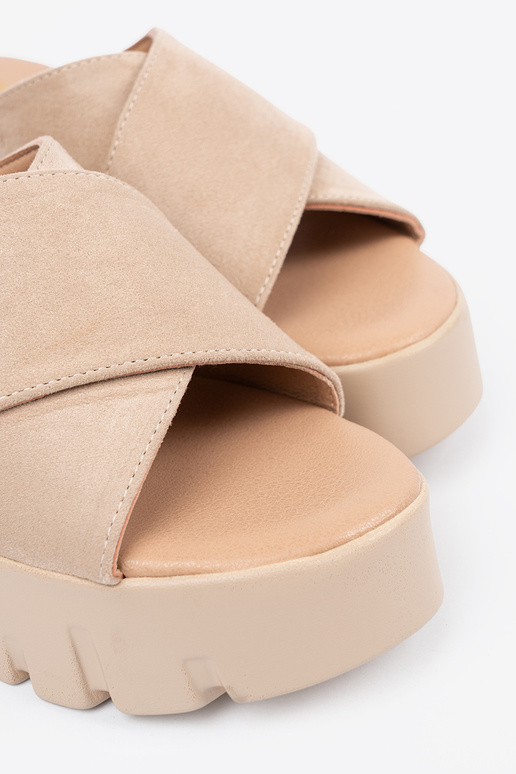 of suede slippers Inomens on a Inedge...