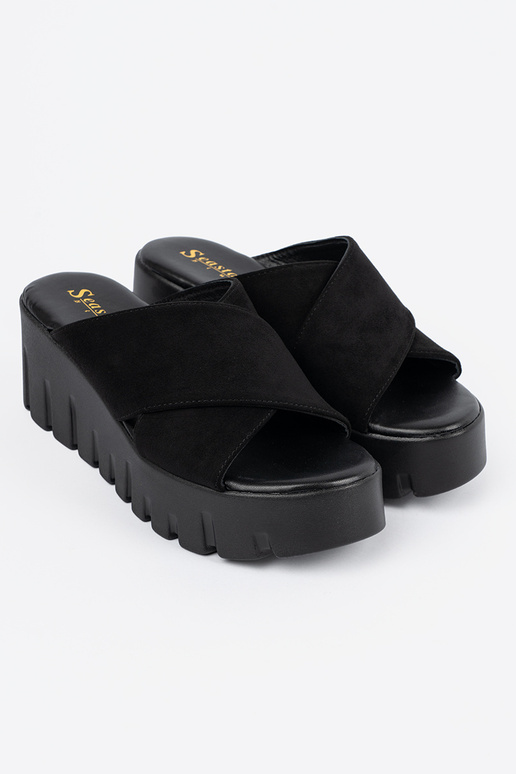 of suede slippers Inomens on a Inedge...