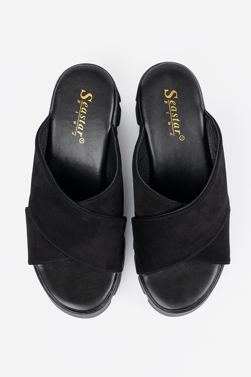 of suede slippers Inomens on a Inedge...