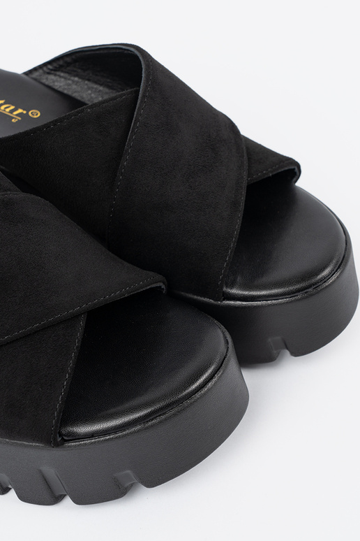 of suede slippers Inomens on a Inedge...