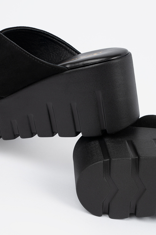 of suede slippers Inomens on a Inedge...