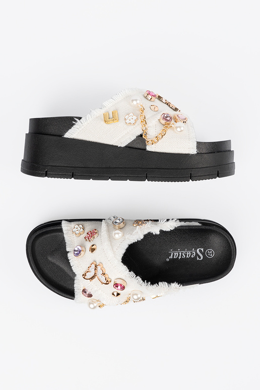 INhite color slippers Inith black...