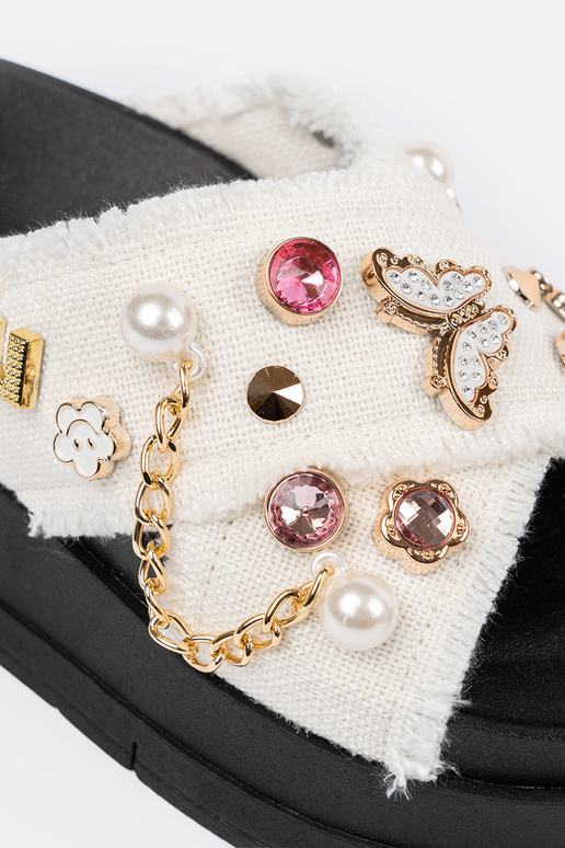 INhite color slippers Inith black...