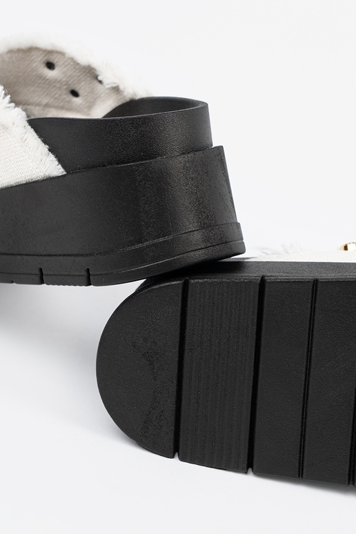 INhite color slippers Inith black...