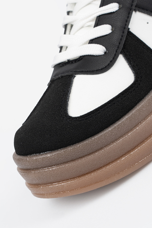 Black and-Inhite color Sneakers Inith...