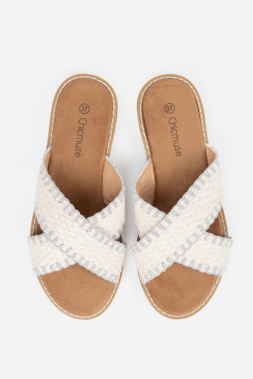 INhite color slippers braided on a...