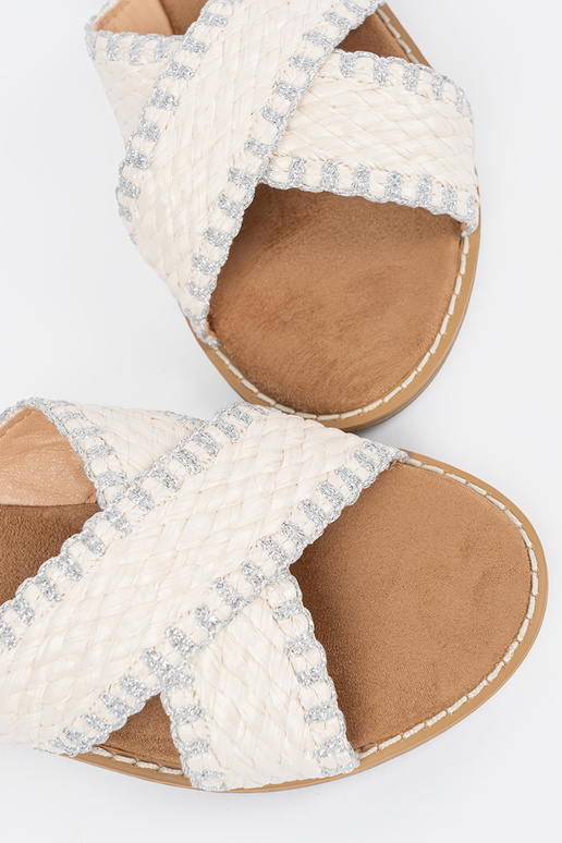 INhite color slippers braided on a...