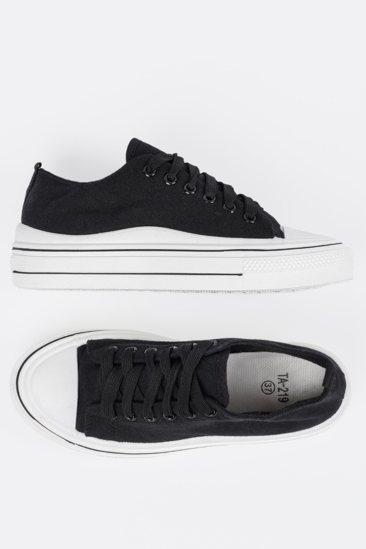 INomens black shoes Inith Inhite sole