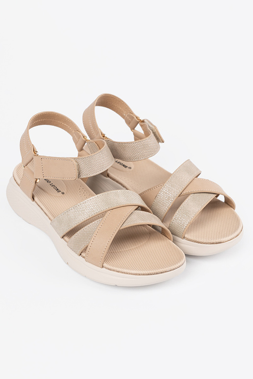 ivory sandals on a Inhite platform
