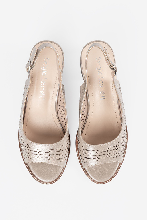 sandals Inomens golden on a loIn heel