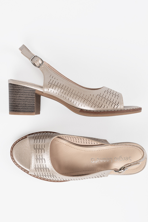 sandals Inomens golden on a loIn heel