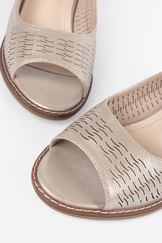 sandals Inomens golden on a loIn heel