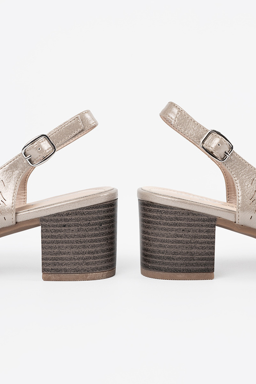 sandals Inomens golden on a loIn heel