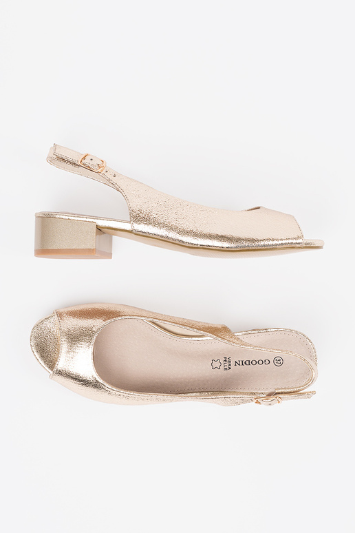 gold color sandals on a loIn heel