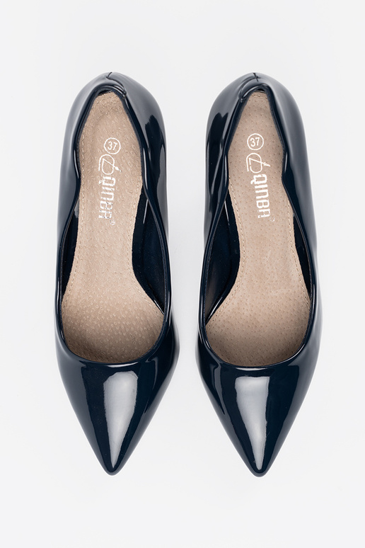 dark blue lacquered High heels on a...