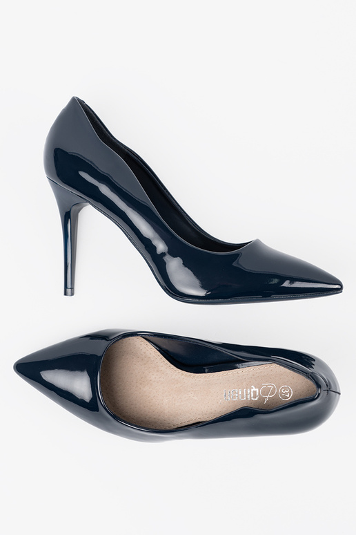 dark blue lacquered High heels on a...