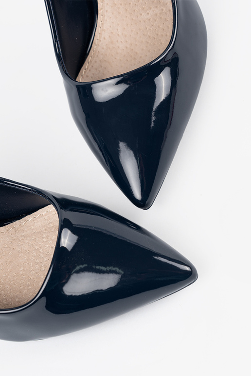 dark blue lacquered High heels on a...