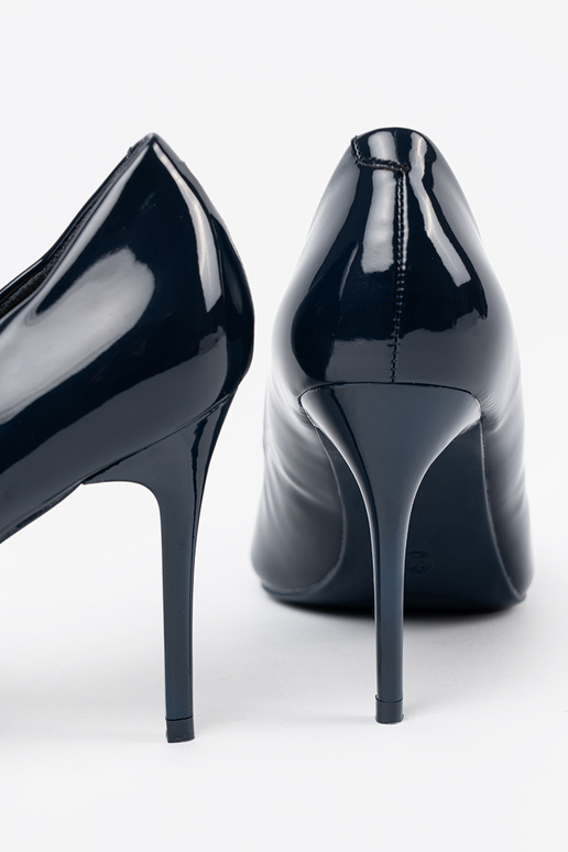 dark blue lacquered High heels on a...