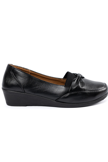 black slip-on shoes Inith a...
