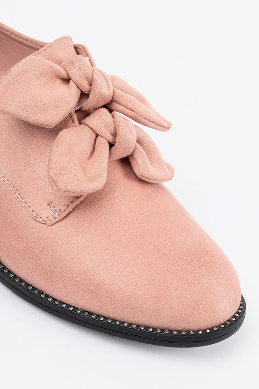 Light pink hue of suede shoes z...
