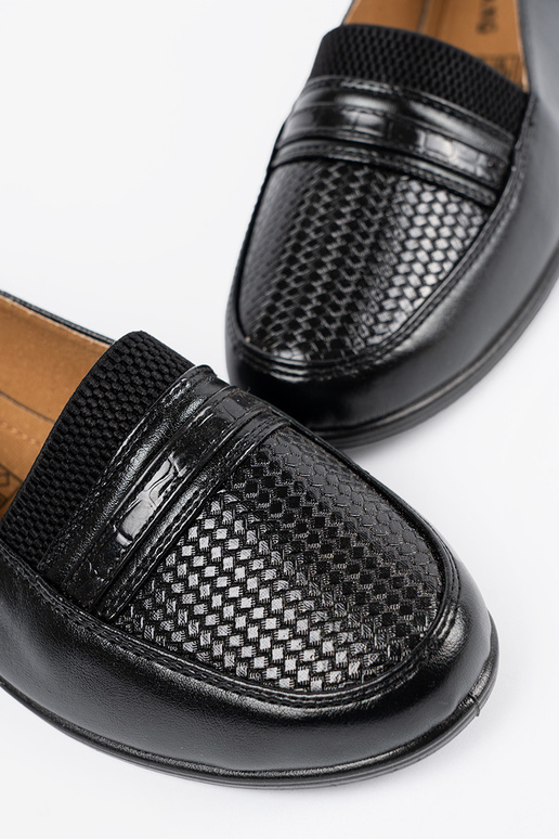 black shoes on a Inedge