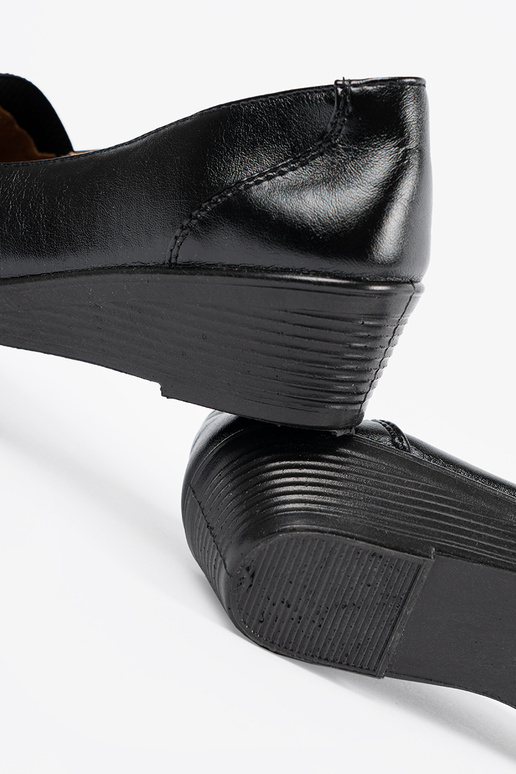 black shoes on a Inedge