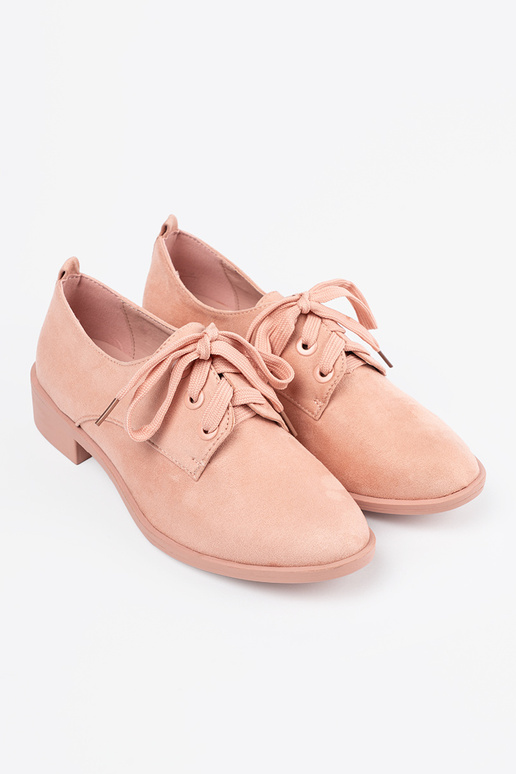 Light pink hue shoes tied