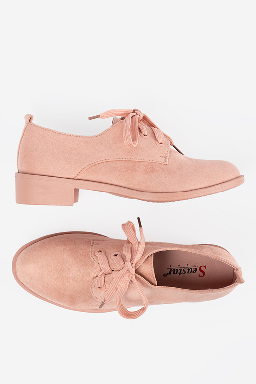 Light pink hue shoes tied