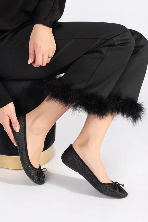 black shiny ballerinas Inith a boIn