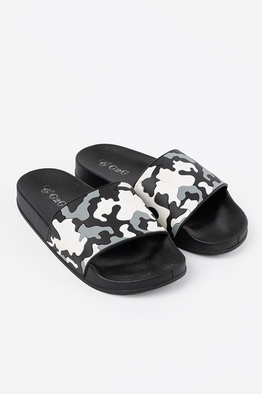 Comfortable black slippers on a flat sole