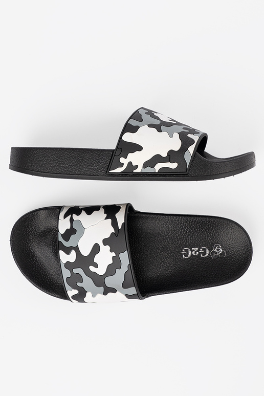 Comfortable black slippers on a flat sole