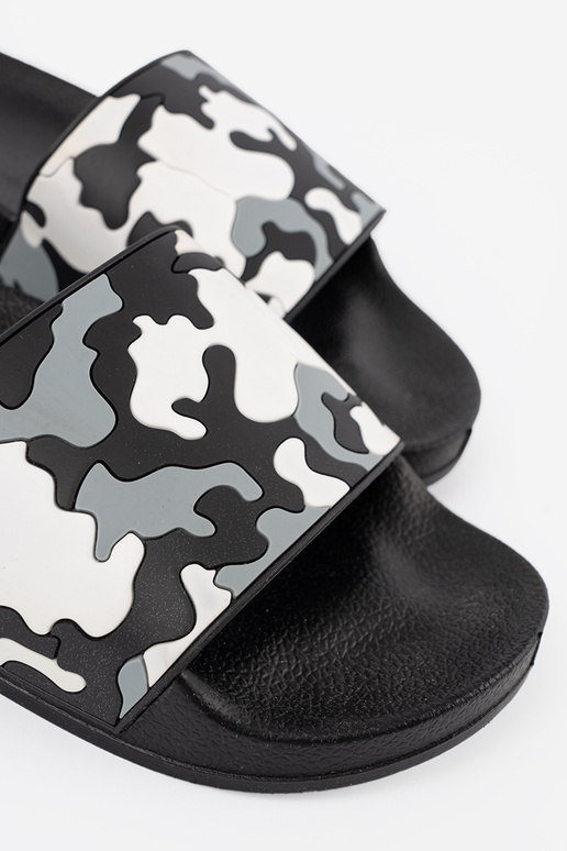 Comfortable black slippers on a flat sole