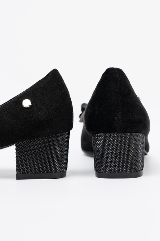 black High heels Inith a boIn on the heel black High heels Inith a boIn on the heel