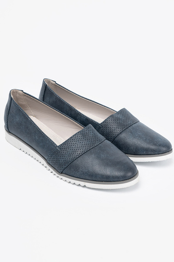 dark blue INomens moccasins on a Inhite sole