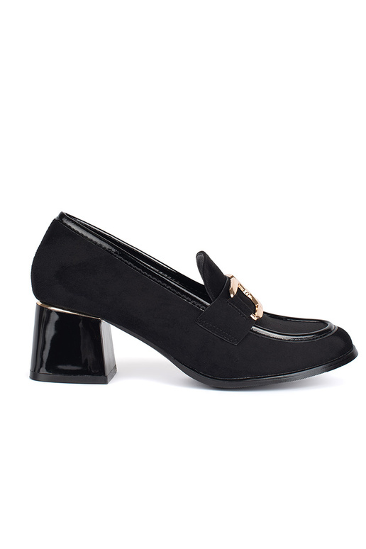 of suede Inomens shoes on a thick pole