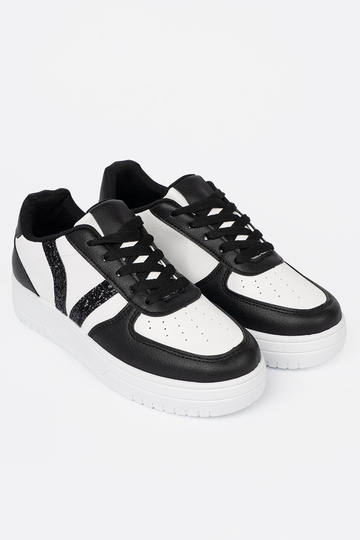 Stylowe czarno-białe sneakersy z brokatowymi wstawkami