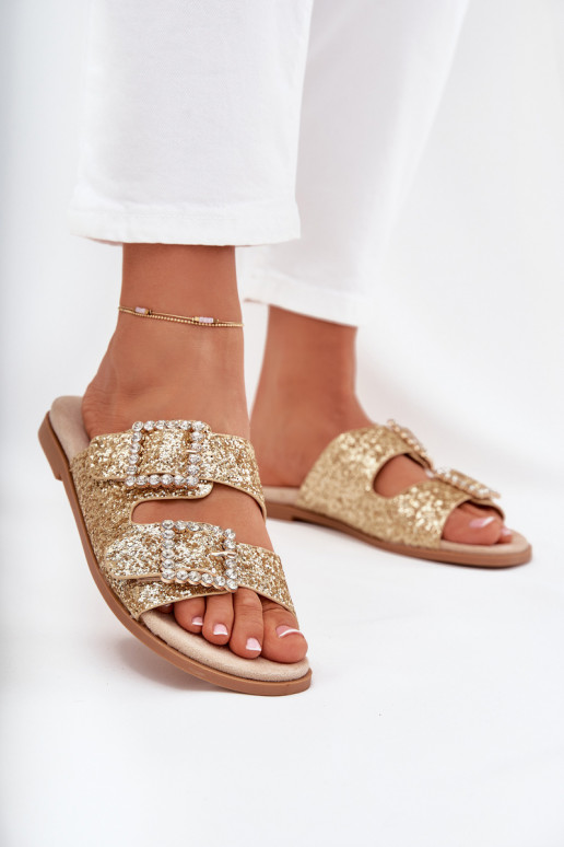 Shiny embellished flip flops with buckles on flat heel gold Tovira Shiny embellished flip flops with buckles on flat heel gold Tovira