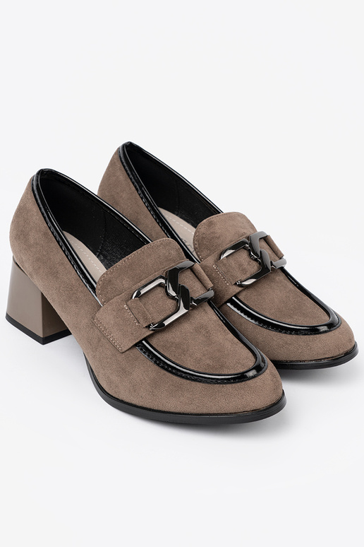 of suede beige shoes on a thick pole