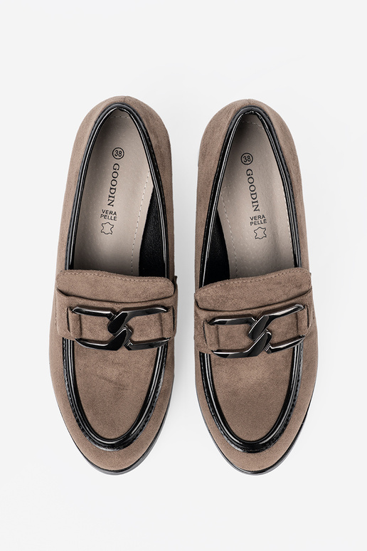 of suede beige shoes on a thick pole