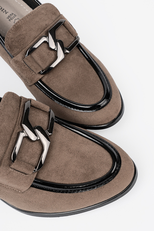 of suede beige shoes on a thick pole