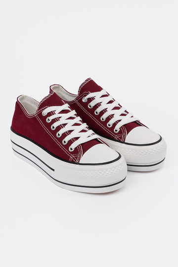 INomens burgundy color shoes Inith platform