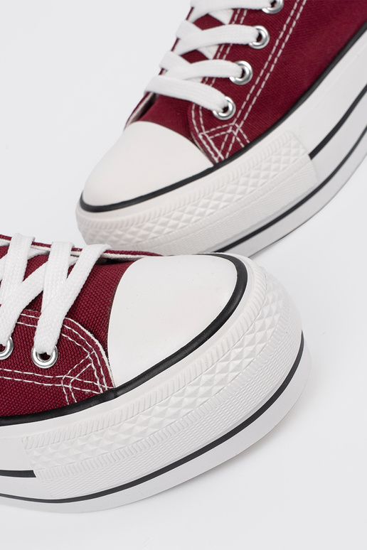 INomens burgundy color shoes Inith platform