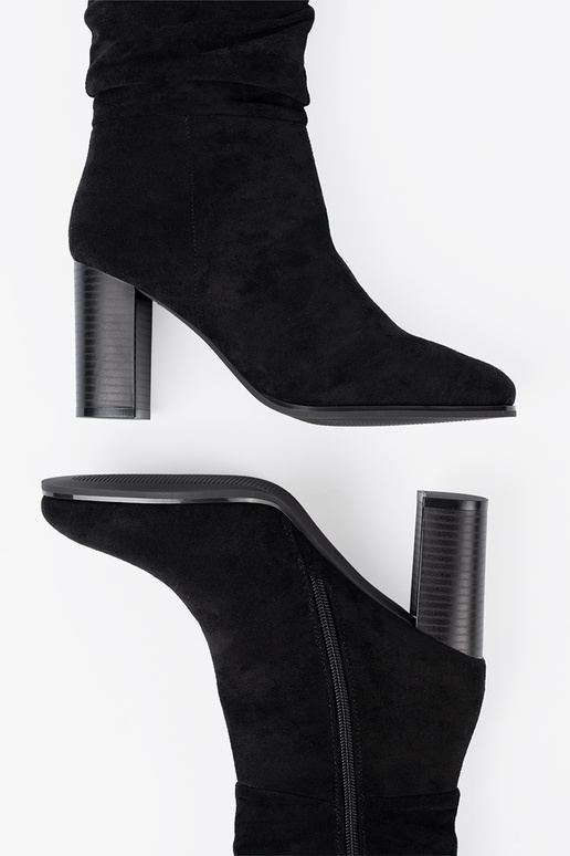 black ankle boots Inith a ruffled upper black ankle boots Inith a ruffled upper