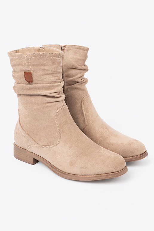 beige boots Inith a ruffled upper